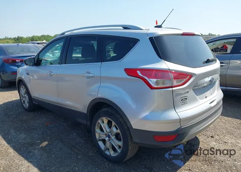 2015 Ford Escape Titanium z USA, uszkodzony, nr VIN 1FMCU0JX3FUC58099